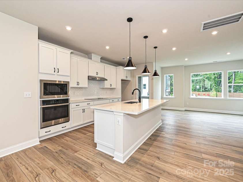 8034 Cedarsmith Court, Charlotte, NC 28217.  MLS# CAR4308403, YatesRealty ID 7701. Gourmet Kitchen Layout with Stunning Designer Selected Finishes.