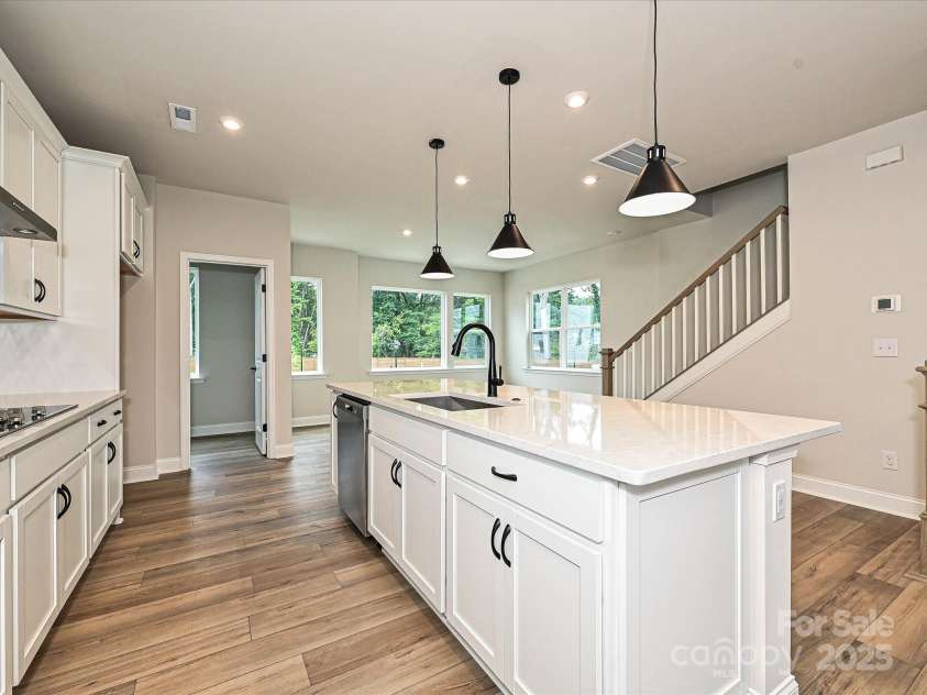 8034 Cedarsmith Court, Charlotte, NC 28217.  MLS# CAR4308403, YatesRealty ID 7701. Large Central Island Packed with Storage and Ideal for Casual Dining.