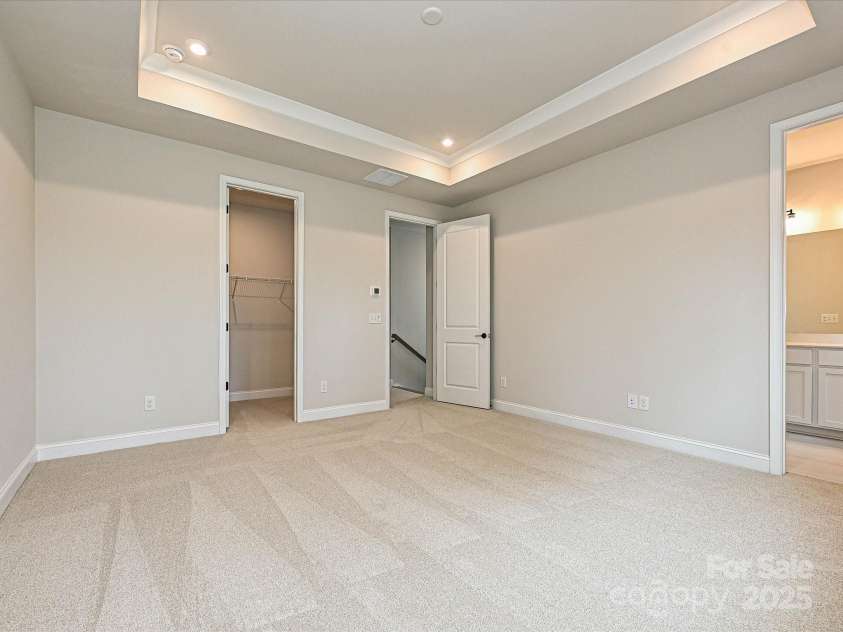 8034 Cedarsmith Court, Charlotte, NC 28217.  MLS# CAR4308403, YatesRealty ID 7701. Primary Suite with En Suite Bath and Large Walk-In Closet.