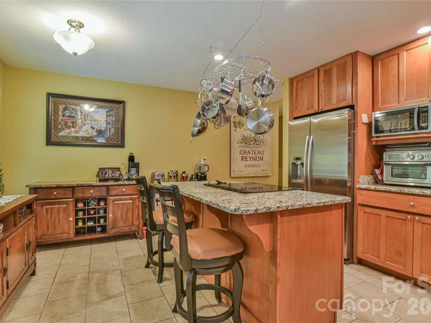 911 Fanning Bridge Road, Fletcher, NC 28732.  MLS# CAR4284907, YatesRealty ID 7706. 