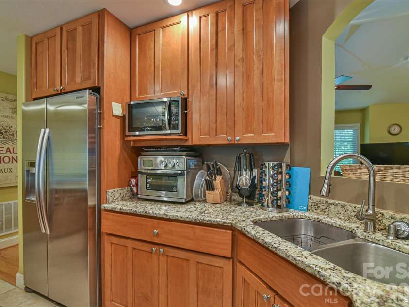 911 Fanning Bridge Road, Fletcher, NC 28732.  MLS# CAR4284907, YatesRealty ID 7706. 