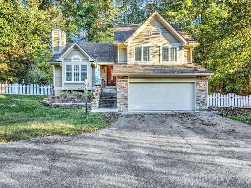 911 Fanning Bridge Road, Fletcher, NC 28732.  MLS# CAR4284907, YatesRealty ID 7706. 