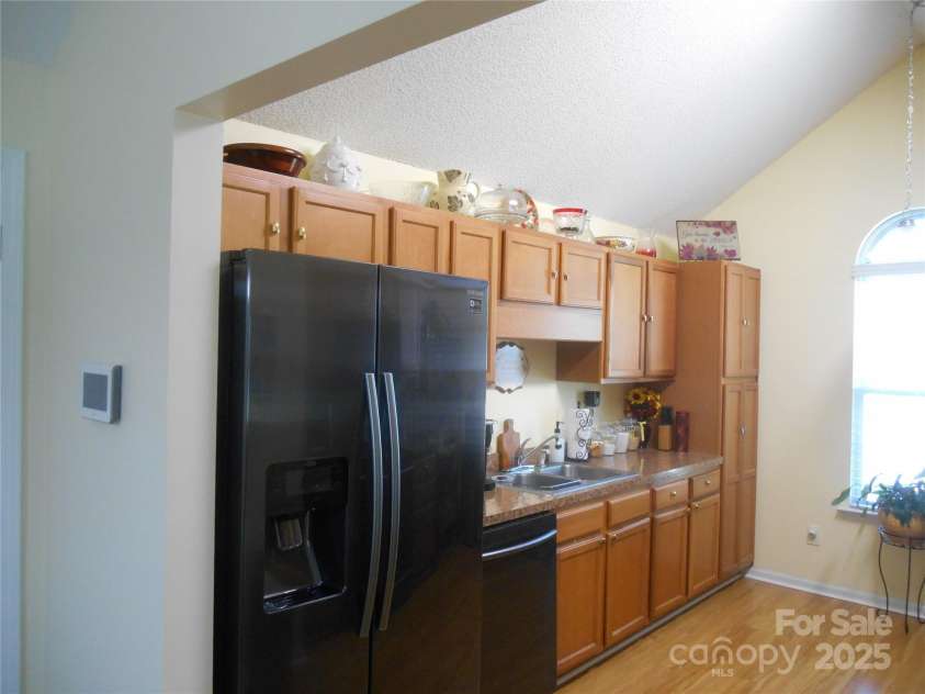 158 Margaret Turner Road, Charlotte, NC 28216.  MLS# CAR4243785, YatesRealty ID 7710. Kitchen with plenty of cabinets.