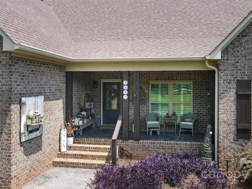 1519 Triplett Road, Cleveland, NC 27013.  MLS# CAR4218302, YatesRealty ID 7715. Always Time To Relax On The Front Porch!