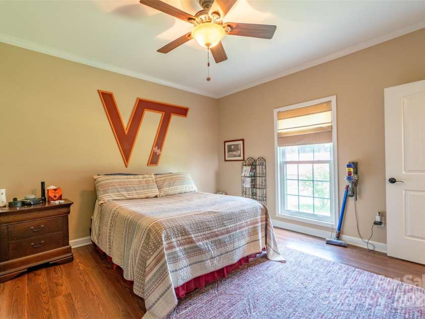 1519 Triplett Road, Cleveland, NC 27013.  MLS# CAR4218302, YatesRealty ID 7715. Large Bedroom With Window In Apartment.
