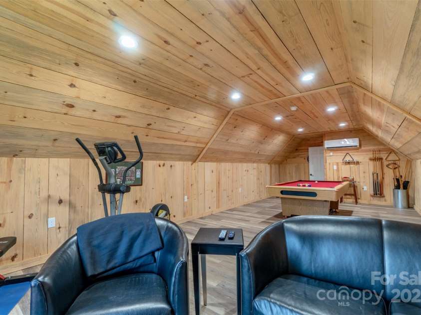 1519 Triplett Road, Cleveland, NC 27013.  MLS# CAR4218302, YatesRealty ID 7715. No Maintenance Rough Sawn Pine Board Walls And Trim In Rec/Exercise/Bonus Room Above 3 Car Garage.  ( NOTE: Heated/Cooled By Mini Split System)