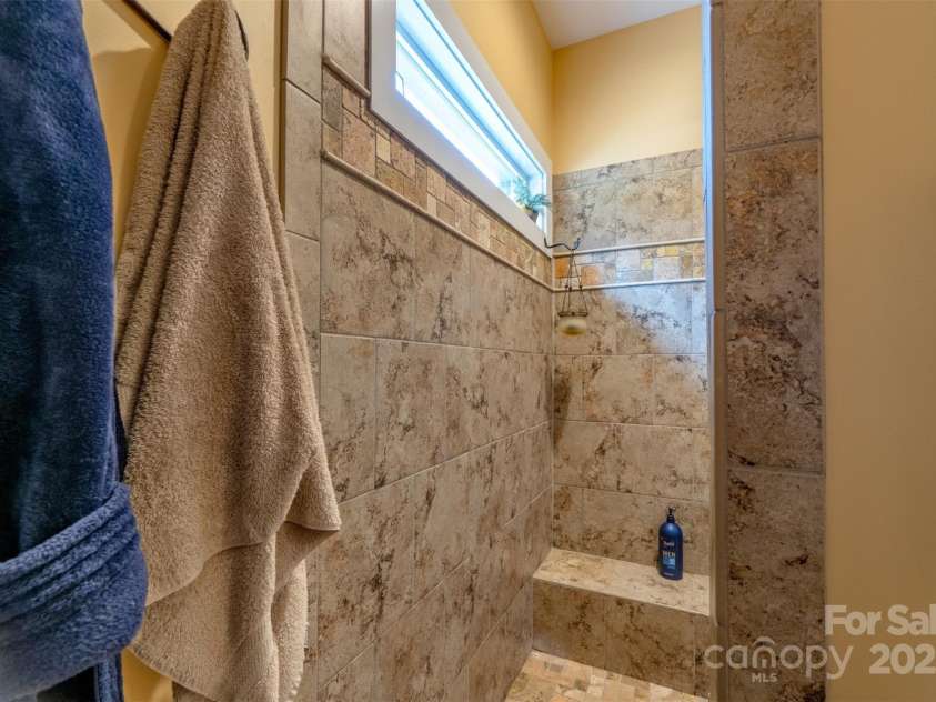 1519 Triplett Road, Cleveland, NC 27013.  MLS# CAR4218302, YatesRealty ID 7715. Uniquely Designed Travertine And Ceramic Tile Walk In Shower -- No Door Or Curtain Needed!