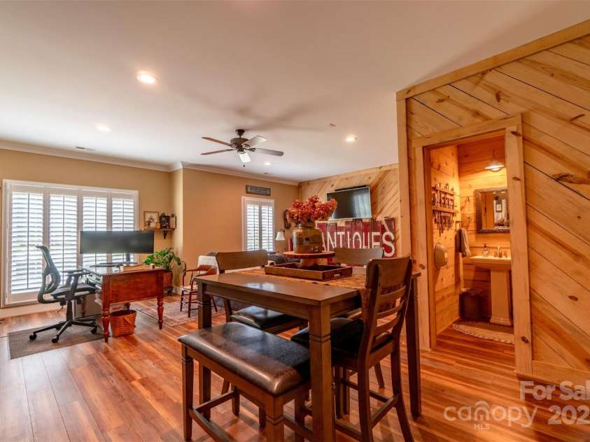 1519 Triplett Road, Cleveland, NC 27013.  MLS# CAR4218302, YatesRealty ID 7715. Wonderful Office/Flex With Rough Sawn Pine Boards Covering 2 Walls And Bathroom.  LVP Flooring, Wide Trim, Recessed Lights, And Plantation Shutters Help Complete This Multipurpose X-Large Space.