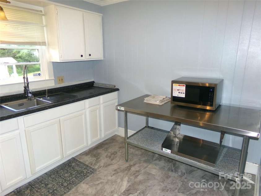 306 Dunlap Street, Albemarle, NC 28001.  MLS# CAR4296716, YatesRealty ID 7720. Kitchen with all appliances 