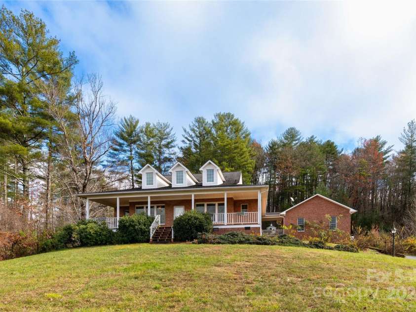 1025 Upper Brush Creek Road, Fairview, NC 28730.  MLS# CAR4195772, YatesRealty ID 7723. Front of home.