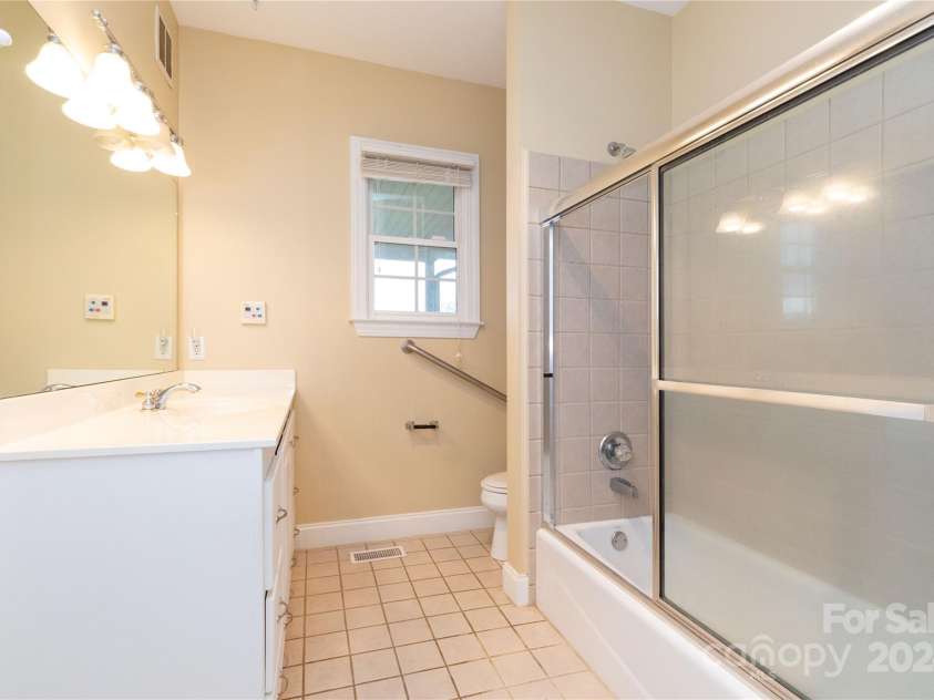 1025 Upper Brush Creek Road, Fairview, NC 28730.  MLS# CAR4195772, YatesRealty ID 7723. Second bathroom.