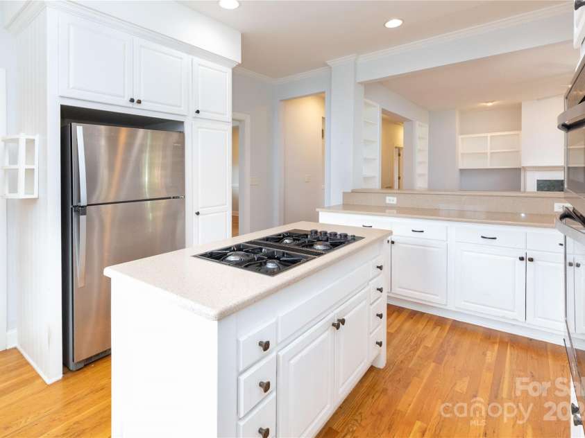 1025 Upper Brush Creek Road, Fairview, NC 28730.  MLS# CAR4195772, YatesRealty ID 7723. Spacious kitchen with stainless steel appliances and gas range.