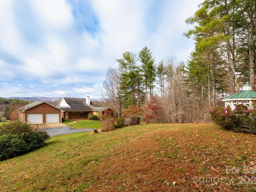 1025 Upper Brush Creek Road, Fairview, NC 28730.  MLS# CAR4195772, YatesRealty ID 7723. View from back of house.