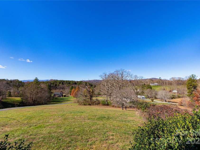 1025 Upper Brush Creek Road, Fairview, NC 28730.  MLS# CAR4195772, YatesRealty ID 7723. View from front porch.