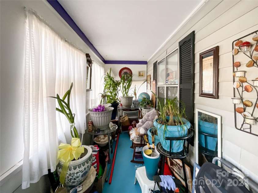 412 18th Street, Charlotte, NC 28206.  MLS# CAR4183498, YatesRealty ID 7724. Front Porch enclosed