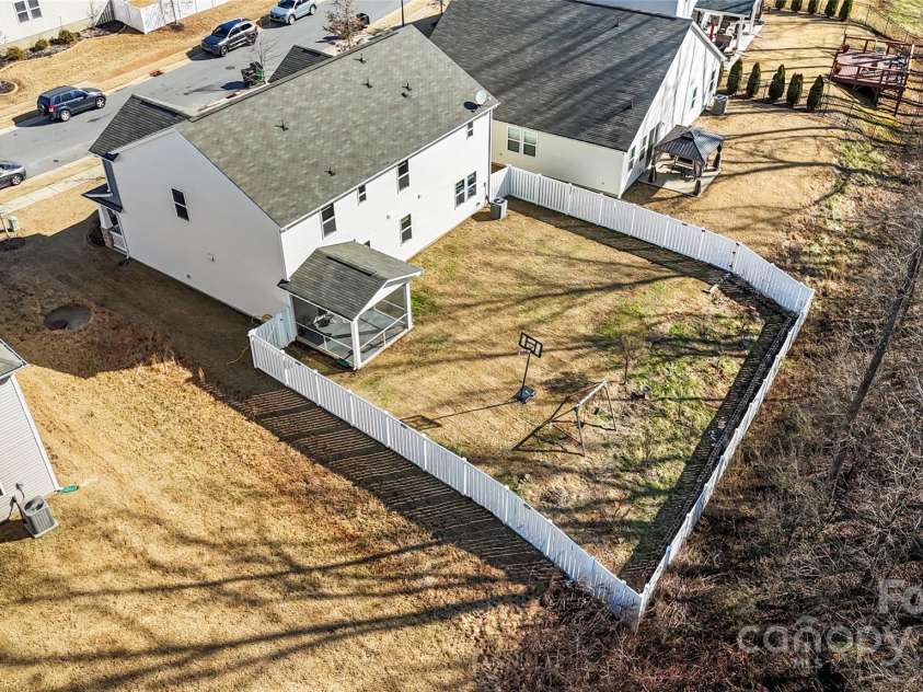 7535 Meridale Forest Drive, Charlotte, NC 28269.  MLS# CAR4221916, YatesRealty ID 7726. Fully fenced in backyard