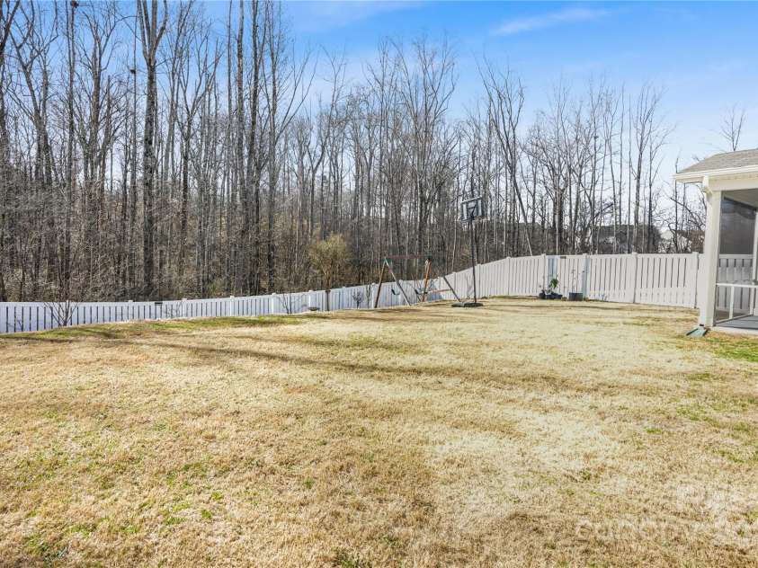 7535 Meridale Forest Drive, Charlotte, NC 28269.  MLS# CAR4221916, YatesRealty ID 7726. Large backyard