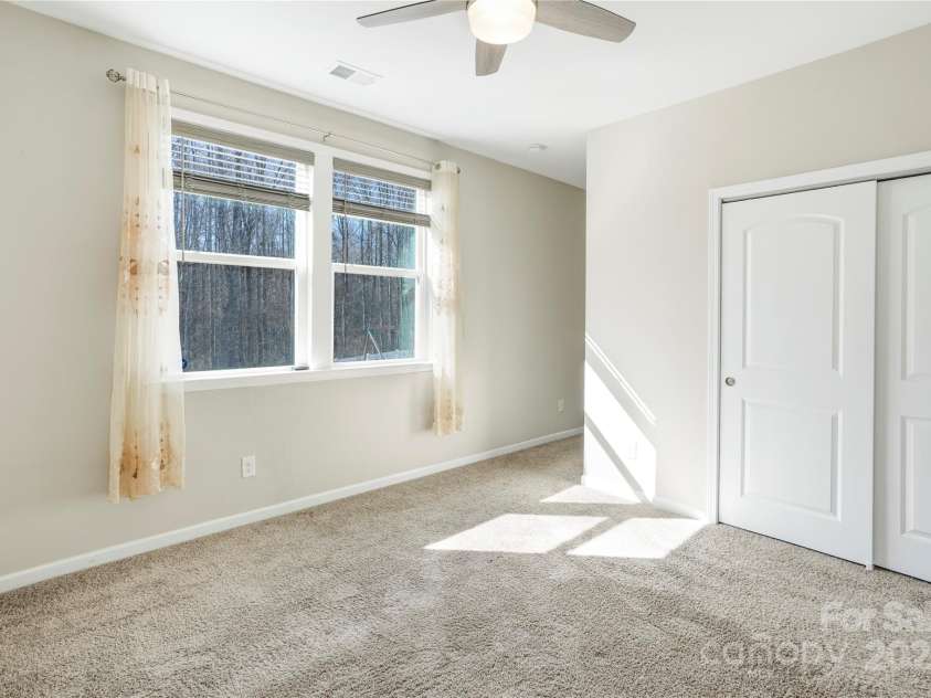 7535 Meridale Forest Drive, Charlotte, NC 28269.  MLS# CAR4221916, YatesRealty ID 7726. Main level bedroom