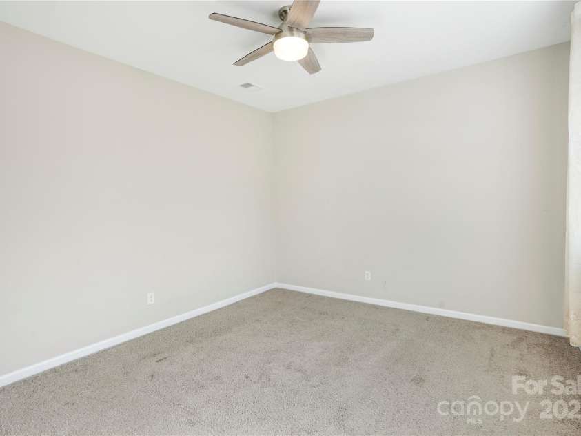 7535 Meridale Forest Drive, Charlotte, NC 28269.  MLS# CAR4221916, YatesRealty ID 7726. Main level bedroom