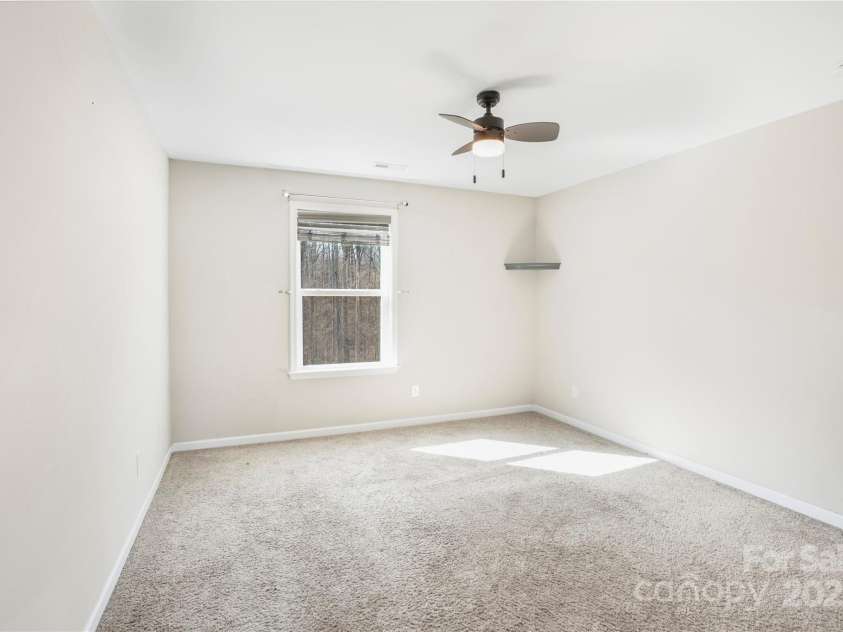 7535 Meridale Forest Drive, Charlotte, NC 28269.  MLS# CAR4221916, YatesRealty ID 7726. Upper level bedroom