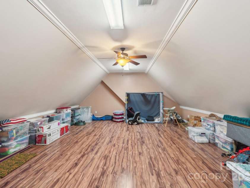 653 Buckleigh Court, Concord, NC 28027.  MLS# CAR4232445, YatesRealty ID 7734. Finished attic currently used as storage room