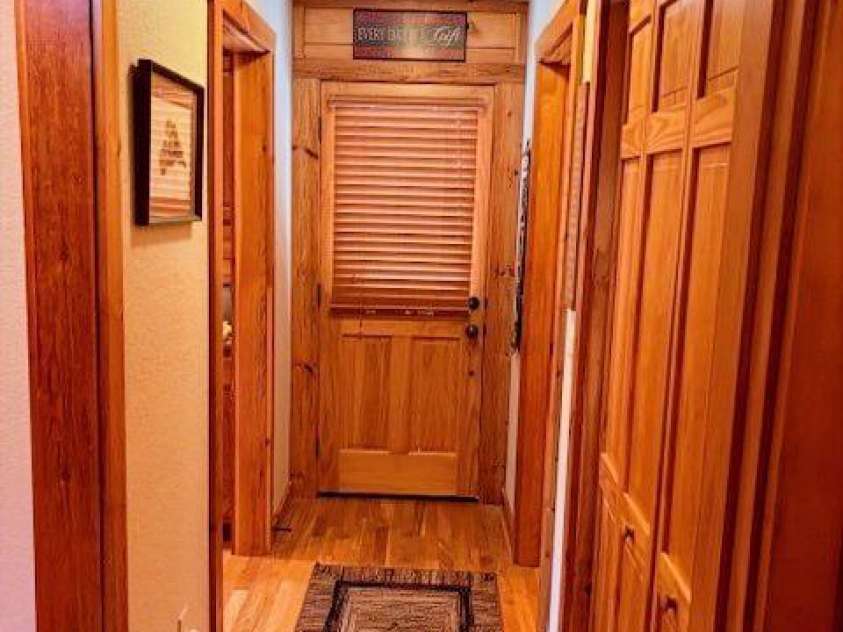 399 Bent Tree Road, Maggie Valley, NC 28751.  MLS# CAR4359236, YatesRealty ID 7738. Entry hallway on main floor