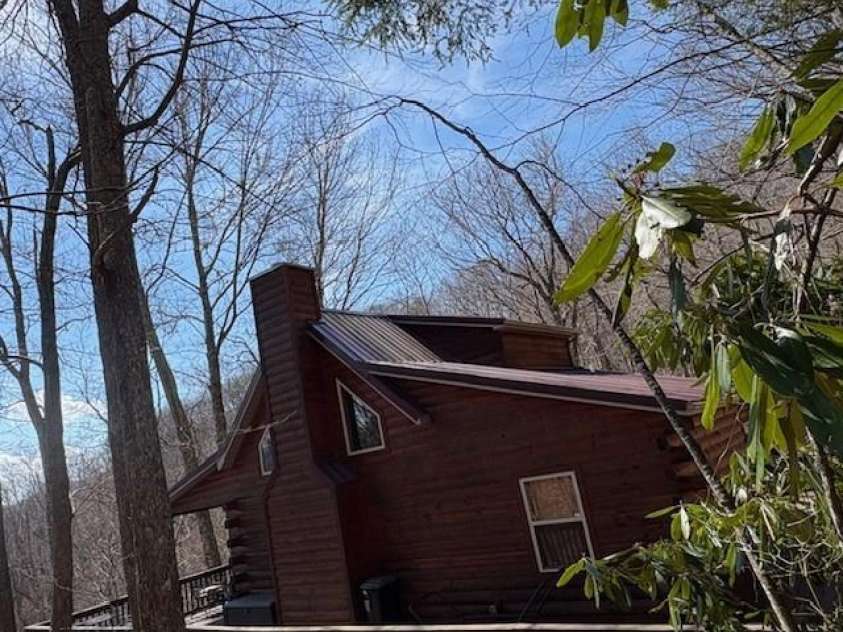 399 Bent Tree Road, Maggie Valley, NC 28751.  MLS# CAR4359236, YatesRealty ID 7738. Far side of home