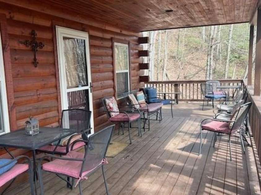 399 Bent Tree Road, Maggie Valley, NC 28751.  MLS# CAR4359236, YatesRealty ID 7738. Front covered porch is 10' deep