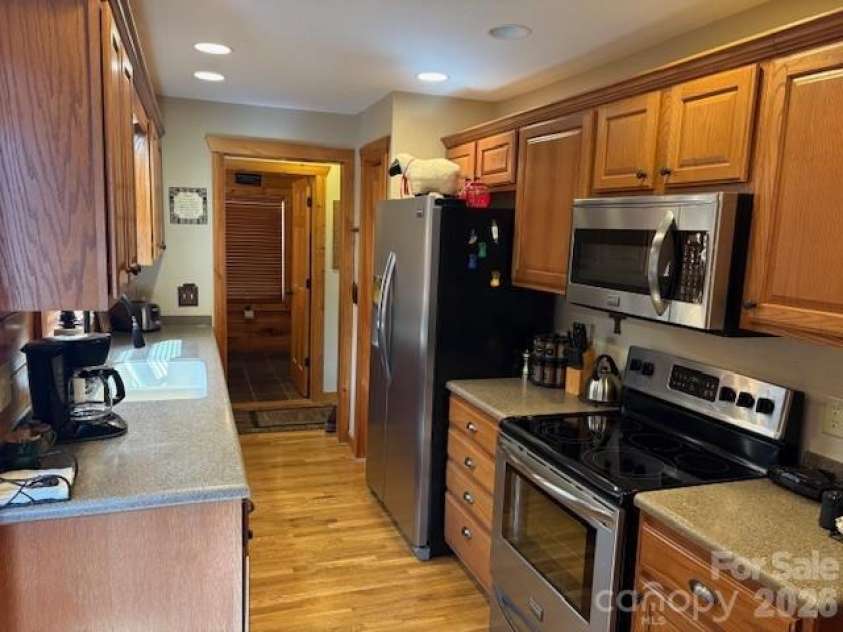 399 Bent Tree Road, Maggie Valley, NC 28751.  MLS# CAR4359236, YatesRealty ID 7738. Kitchen; another angle