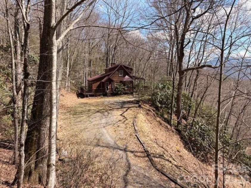 399 Bent Tree Road, Maggie Valley, NC 28751.  MLS# CAR4359236, YatesRealty ID 7738. Nestled in a natural setting
