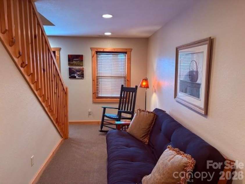 399 Bent Tree Road, Maggie Valley, NC 28751.  MLS# CAR4359236, YatesRealty ID 7738. Sitting area in lower level
