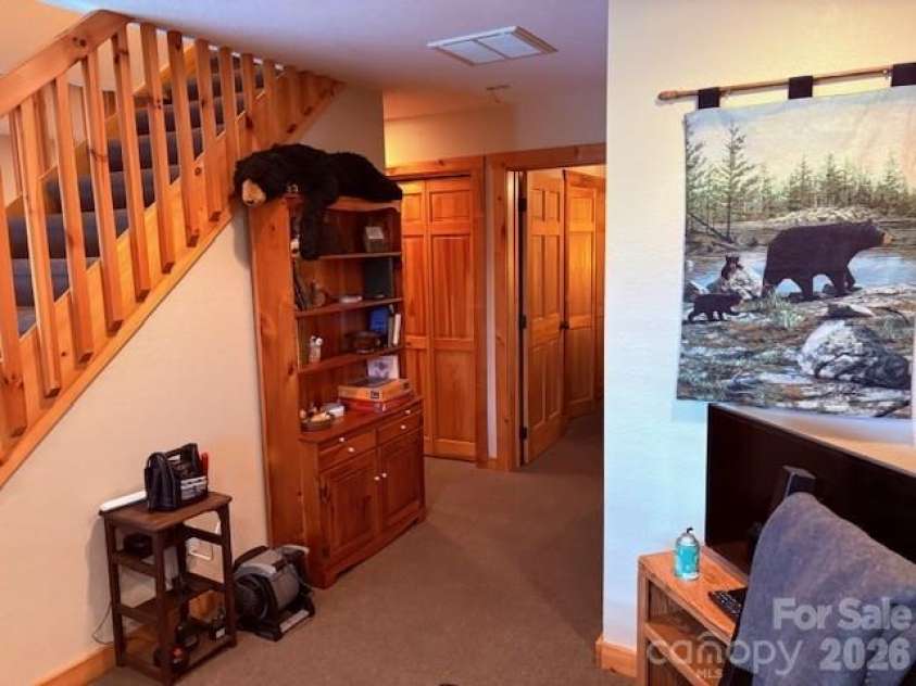 399 Bent Tree Road, Maggie Valley, NC 28751.  MLS# CAR4359236, YatesRealty ID 7738. Tv/media area in lower level