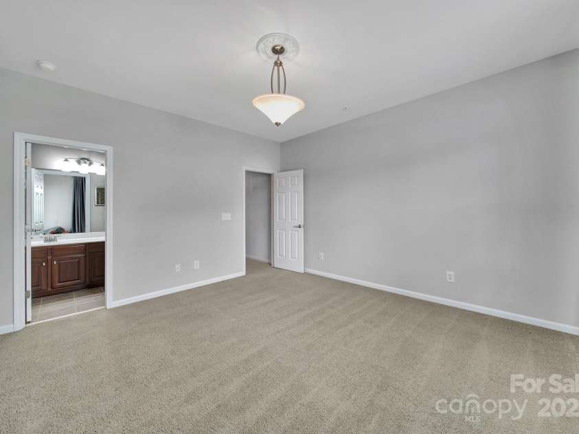 314 Wave Crest Drive, Tega Cay, SC 29708.  MLS# CAR4245002, YatesRealty ID 7739. 2nd Floor Front Bedroom