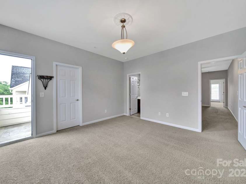 314 Wave Crest Drive, Tega Cay, SC 29708.  MLS# CAR4245002, YatesRealty ID 7739. 2nd Floor Front Bedroom w/ Deck