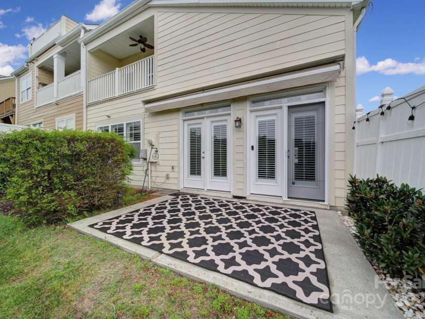 314 Wave Crest Drive, Tega Cay, SC 29708.  MLS# CAR4245002, YatesRealty ID 7739. Back Patio w/ Awning retracted