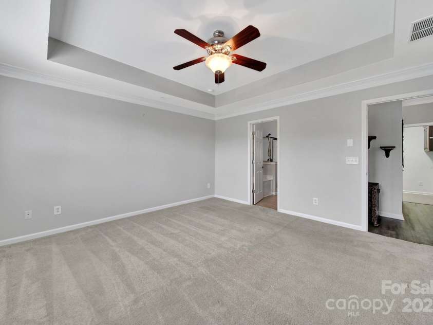 314 Wave Crest Drive, Tega Cay, SC 29708.  MLS# CAR4245002, YatesRealty ID 7739. Primary Bedroom 1st Floor