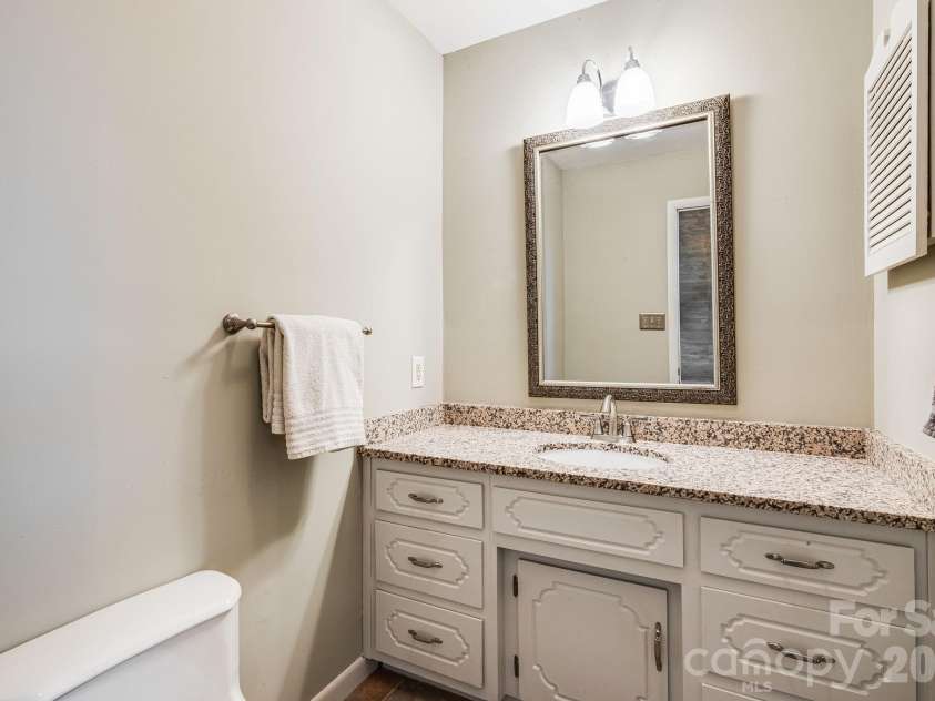 15 Crest Circle Drive, Weaverville, NC 28787.  MLS# CAR4326373, YatesRealty ID 7740. Half Bath
