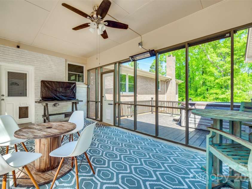 1540 Neely Store Road, Rock Hill, SC 29730.  MLS# CAR4247338, YatesRealty ID 7744. An inviting screened porch connects the main home to the bungalow.