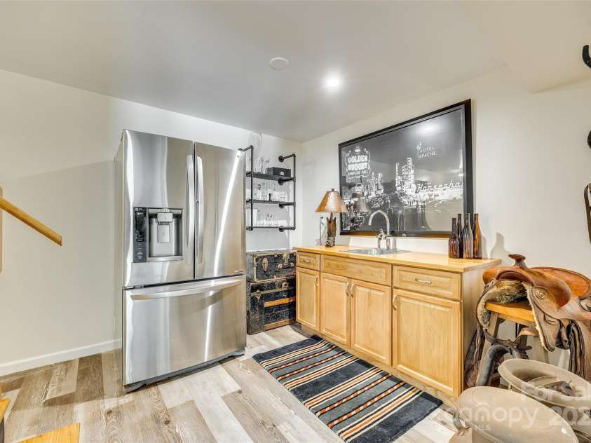 1540 Neely Store Road, Rock Hill, SC 29730.  MLS# CAR4333390, YatesRealty ID 7744. Lower level wet bar.