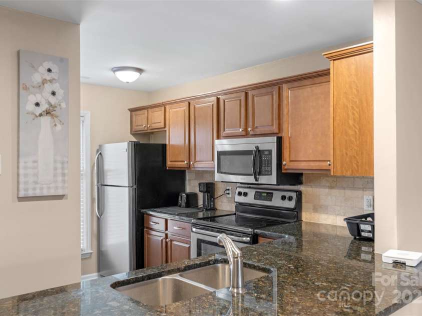 9029 J M Keynes Drive, Charlotte, NC 28262.  MLS# CAR4249390, YatesRealty ID 7745. 