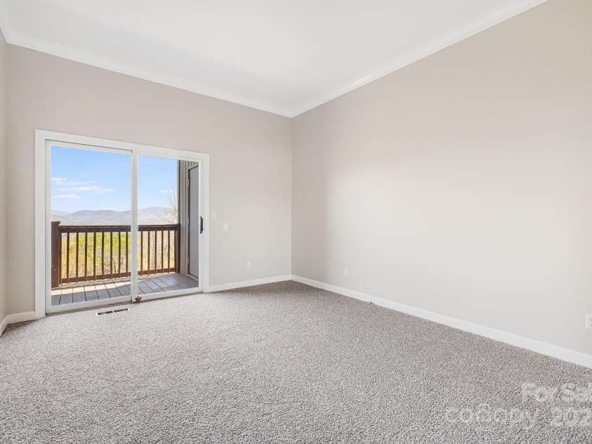 546 Windswept Drive, Asheville, NC 28801.  MLS# CAR4248242, YatesRealty ID 7747. Bedroom with Private Deck Access