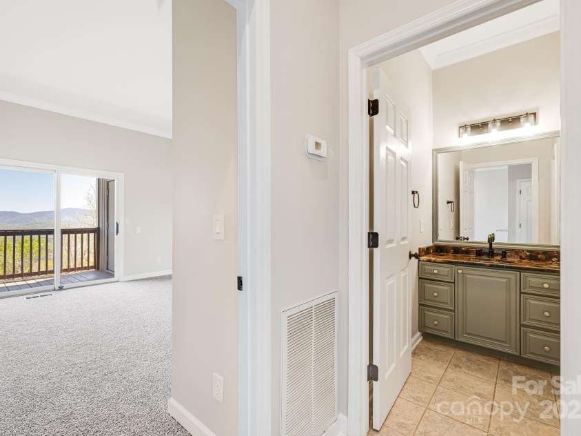 546 Windswept Drive, Asheville, NC 28801.  MLS# CAR4248242, YatesRealty ID 7747. Second Bedroom Adjacent to Hallway Bathroom