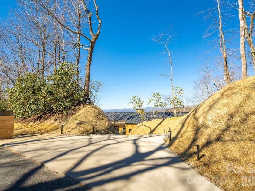 1882 Connestee Trail, Brevard, NC 28712.  MLS# CAR4353280, YatesRealty ID 7756. 