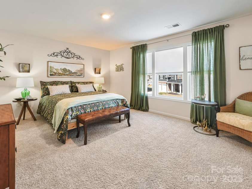 51 Thornberry Road, Hendersonville, NC 28792.  MLS# CAR4237686, YatesRealty ID 7757. Upstairs Bedroom