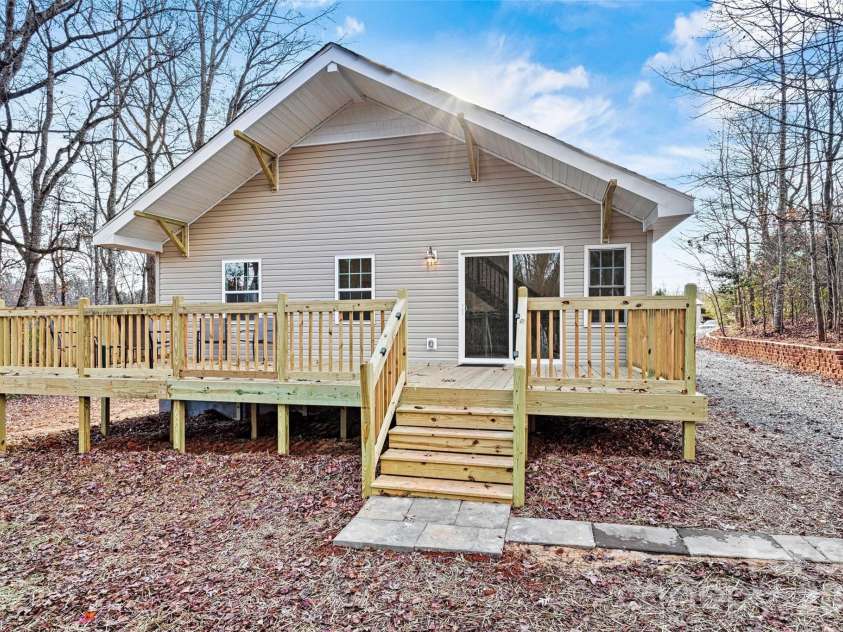 6051 Pointe West Lane, Vale, NC 28168.  MLS# CAR4357030, YatesRealty ID 7760. Back view of home 