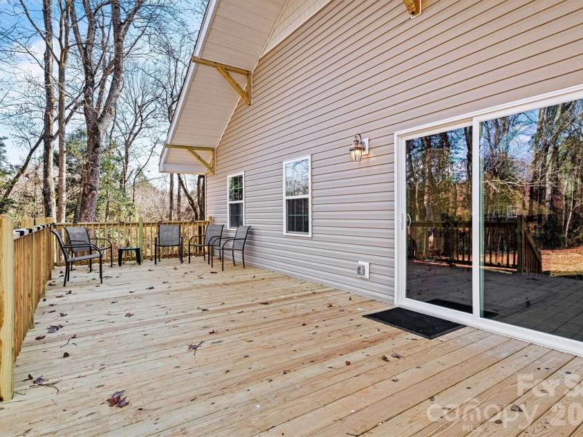 6051 Pointe West Lane, Vale, NC 28168.  MLS# CAR4357030, YatesRealty ID 7760. Beautiful back deck 