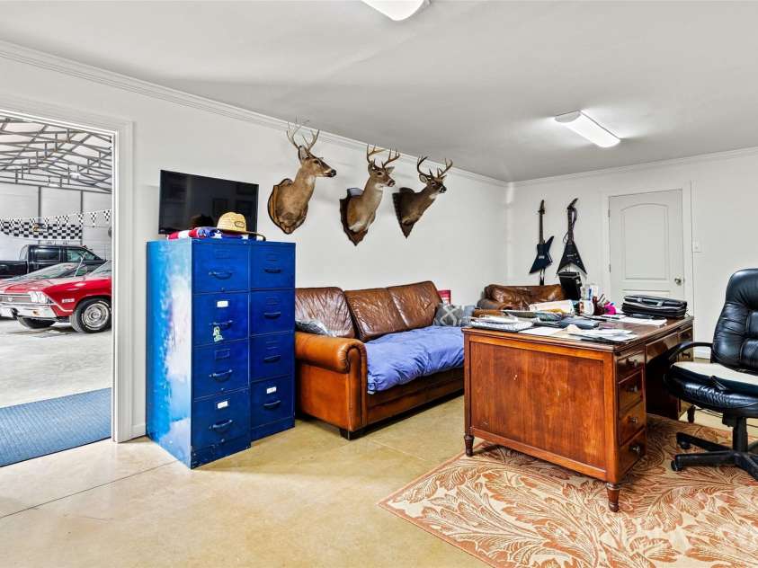 6051 Pointe West Lane, Vale, NC 28168.  MLS# CAR4357030, YatesRealty ID 7760. Home office space located in the garage 