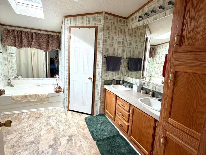 3033 Feather Street, Concord, NC 28025.  MLS# CAR4342293, YatesRealty ID 7761. Masterbath