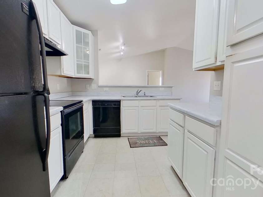 10526 Hill Point Court, Charlotte, NC 28262.  MLS# CAR4246661, YatesRealty ID 7763. View from laundry room doorway