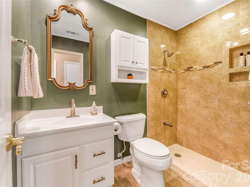 102 Boyd Drive, Flat Rock, NC 28731.  MLS# CAR4291135, YatesRealty ID 7764. Hall Bathroom